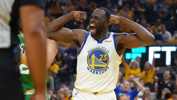 Jun 2, 2022; San Francisco, California, USA; Golden State Warriors forward Draymond Green (23) reacts after a basket against the Boston Celtics during the first half in game one of the 2022 NBA Finals at Chase Center. Mandatory Credit: Kyle Terada-USA TODAY Sports